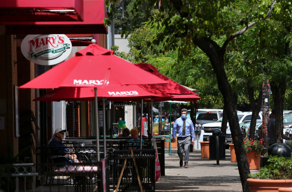 The City of Santa Rosa plans to close three blocks of Fourth Street to create a downtown promenade that will allow businesses to use sidewalk and street parking areas to seat customers outdoors. (Christopher Chung/ The Press Democrat)
