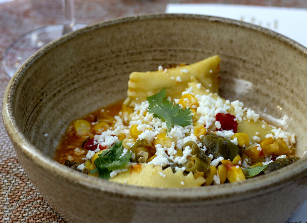 Elote agnilotti with roasted corn, charred shishito pepper, lime, cotija, cilantro at Bricoleur Vineyards’ Summer Classic Wine Dinner Series. (Heather Irwin / Sonoma Magazine)