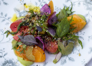 Heirloom tomato salad with compressed cucumber, opal basil, browkaw avocado and toasted seeds at Bricoleur Vineyards. (Heather Irwin / Sonoma Magazine)