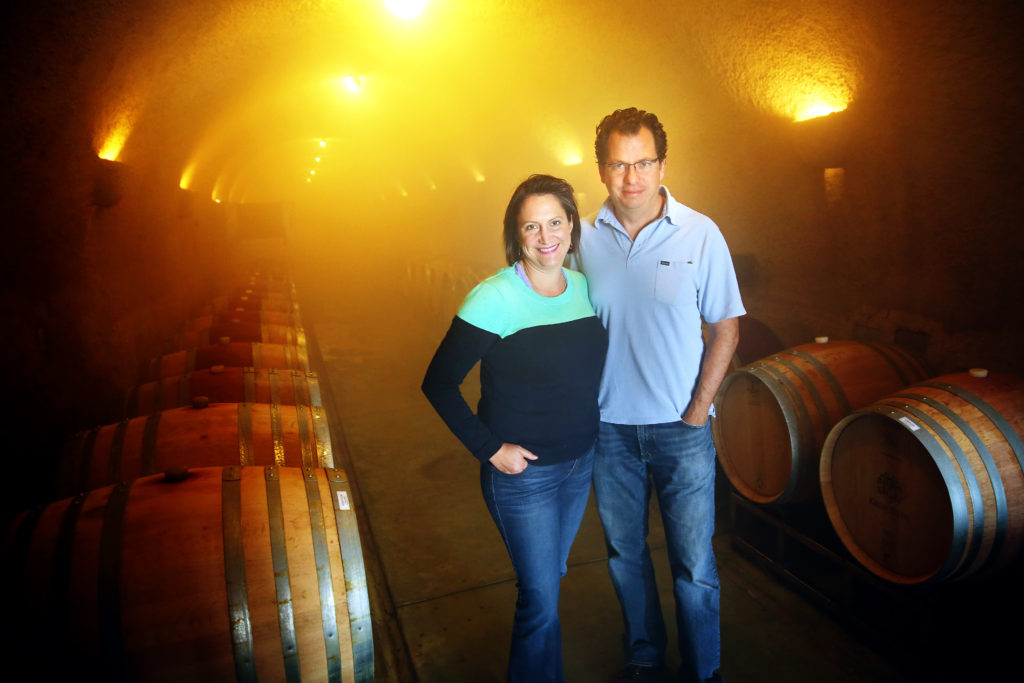 2/5/2014: D1: PC: Ana Keller and her husband Diego Tomda stand in the dense moisture helping control the aging of the wines in their cellars at Keller Estate Winery in Petaluma on Sunday, January 26, 2014. (Conner Jay/The Press Democrat)