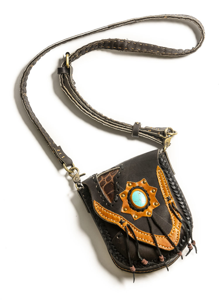 A leather purse made by artist and Comanche descendent Kerry Mitchell, owner of Native Riders in Sebastopol. (John Burgess/The Press Democrat)