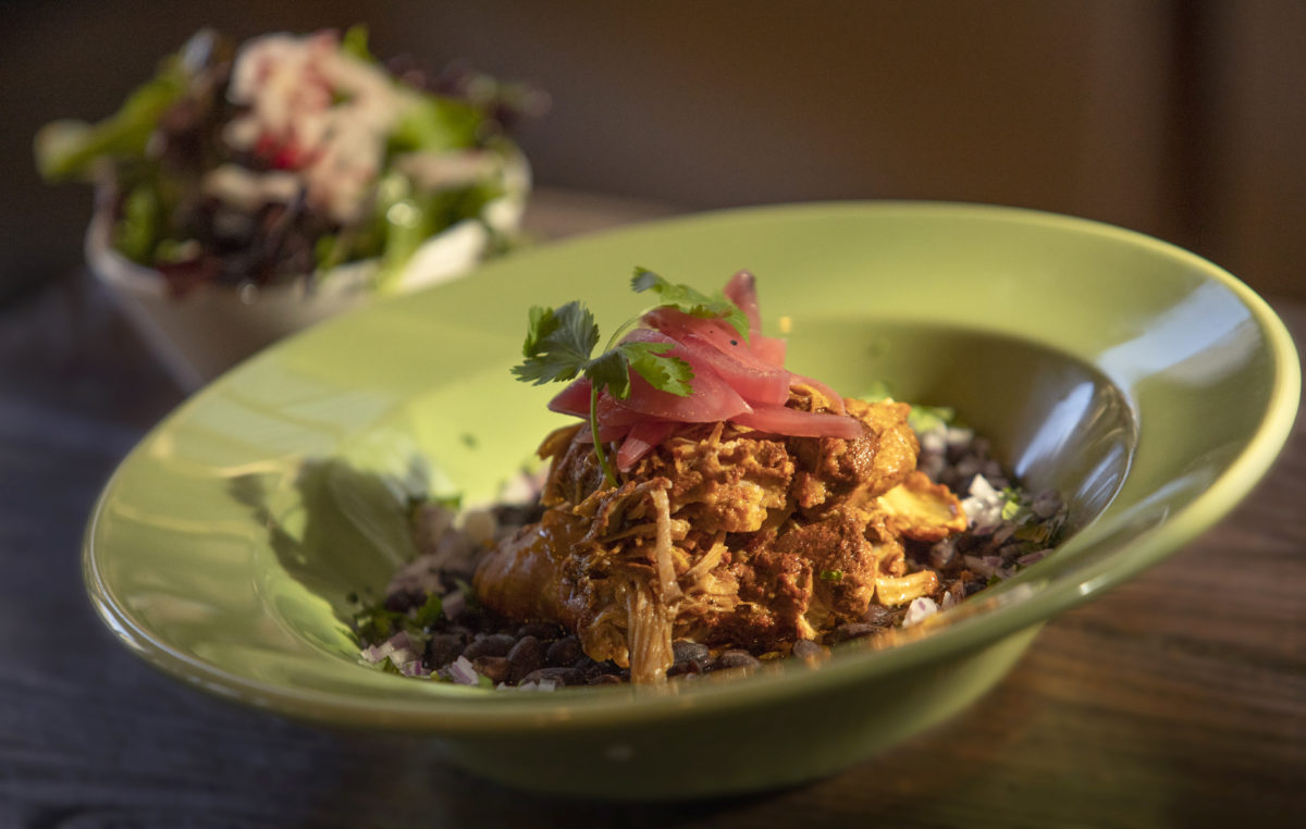 Cochinita Pibil with braised pork, salsa habanero, chars beans, red onions and cilantro from Cascabel Mexican Bar & Grill in Santa Rosa. (John Burgess/The Press Democrat)