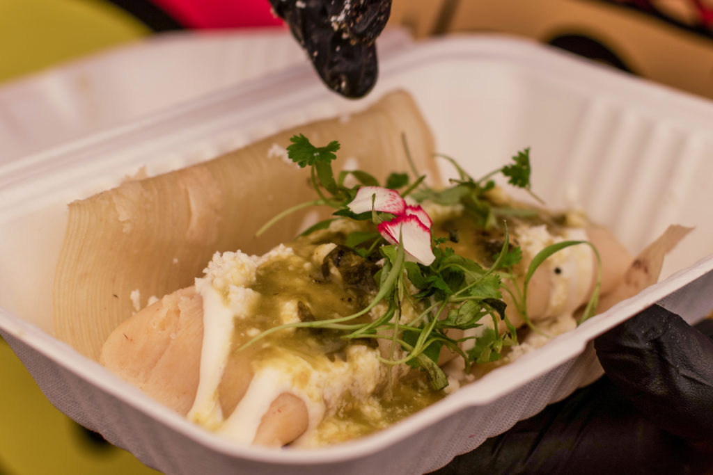 Veggie tamale with crema and cotija cheese, salsa verde at Tamales Oaxaquenos in Roseland. (Heather Irwin / The Press Democrat)