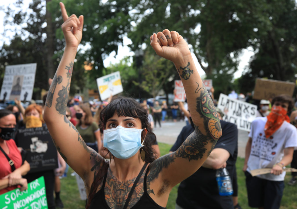Kimberly Barbosa of Sebastopol chants 'Black Lives Matter' during a protest/rally at the Healdsburg Plaza, Thursday, June 11, 2020. (Kent Porter / The Press Democrat) 2020