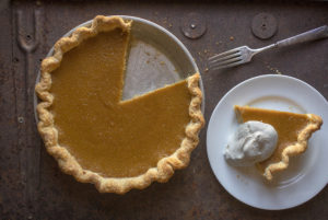 Pumpkin pie with whipped cream and a fresh grate of nutmeg on top. (photo by John Burgess/The Press Democrat)