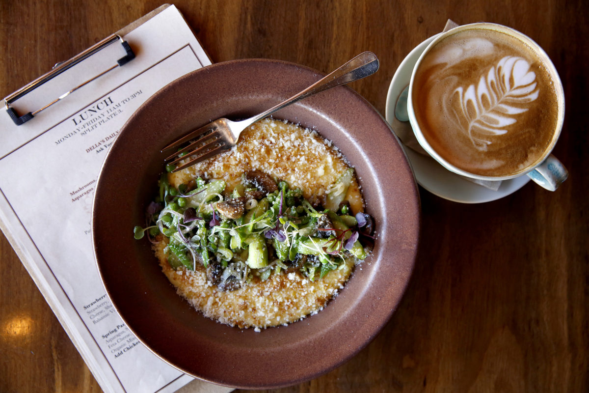 Creamy polenta with poached eggs and vegetables at Della Fattoria in Petaluma. (Beth Schlanker/The Press Democrat)