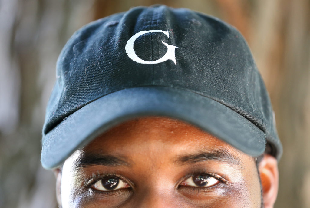 Andrew Akufo models his Gapelii Brand's cotton Dad Hat. (Christopher Chung / The Press Democrat)