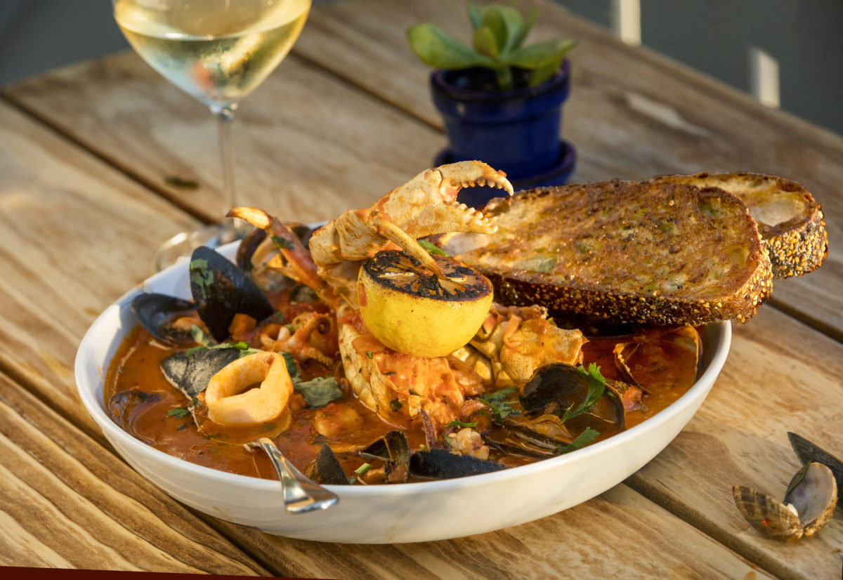 Blue Ridge Cioppino with crab, octopus, clams, mussels, salmon, prawns, fresh basil and garlic toast from the Blue Ridge Kitchen in Sebastopol's Barlow district. (John Burgess/The Press Democrat)