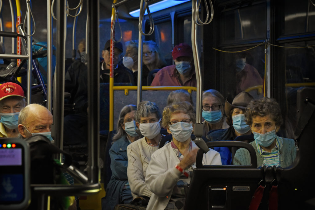 Elderly fire evacuees from Oakmont Gardens wait in a city bus at the Veterans Memorial Auditorium in Santa Rosa, Calif. on Monday, September 28, 2020. (Photo: Erik Castro/for The Press Democrat)