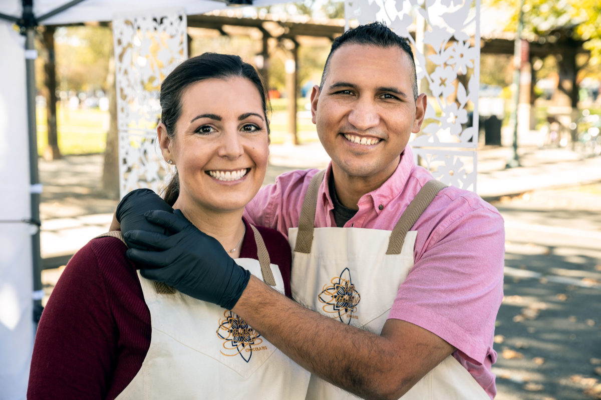 Fleur Sauvage chocolatiers Robert and Tara Nieto at the Windsor farmers market. (Chris Hardy/for Sonoma Magazine)