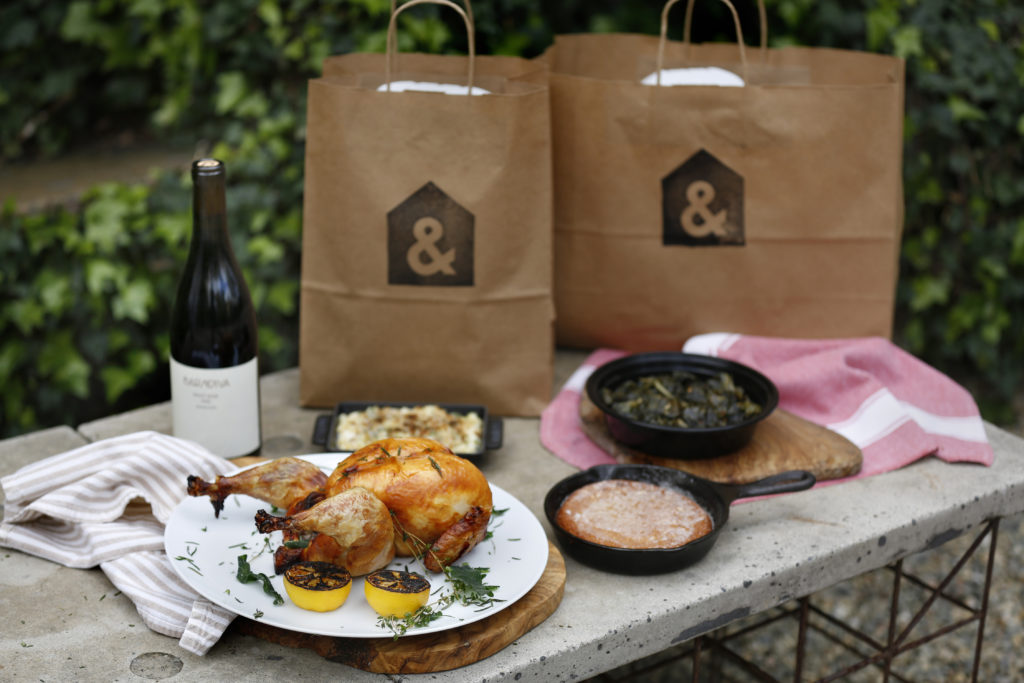 A whole roasted chicken with fried herbs, the mac and cheese with white cheddar, grana padano, and bread crumbs, the hoe cake, a polenta cornbread cake with maple butter, and apple braised collard greens. from the to-go menu at Barndiva in Healdsburg, California on Thursday, March 26, 2020. (BETH SCHLANKER/The Press Democrat)