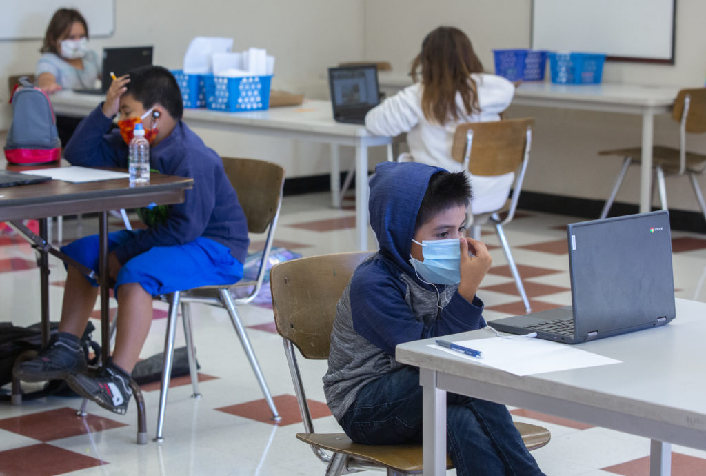 Social distancing is observed and masks are worn by students using the learning pods at Altimira Middle School, sponsored by The Boys and Girls Clubs of Sonoma. Staff are always on hand to help students with any questions they may have. (Photo by Robbi Pengelly/Index-Tribune)