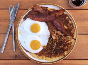 An homage to Ford’s Cafe, a giant pancake, hash browns, bacon and eggs at Kivelstadt Cellars in Sonoma. Heather Irwin/PD