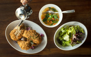 Fried Chicken Dinner for Two with a green salad, bean cassoulet and chicken gravy from Table Culture Provisions in Petaluma. (John Burgess/The Press Democrat)