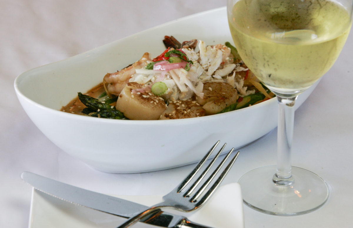 The seafood special of Dungeness crab, deep sea scallops, and prawns in a yellow curry sauce at SEA Thai Bistro in Santa Rosa on Wednesday April 3, 2013. (Scott Manchester/The Press Democrat)