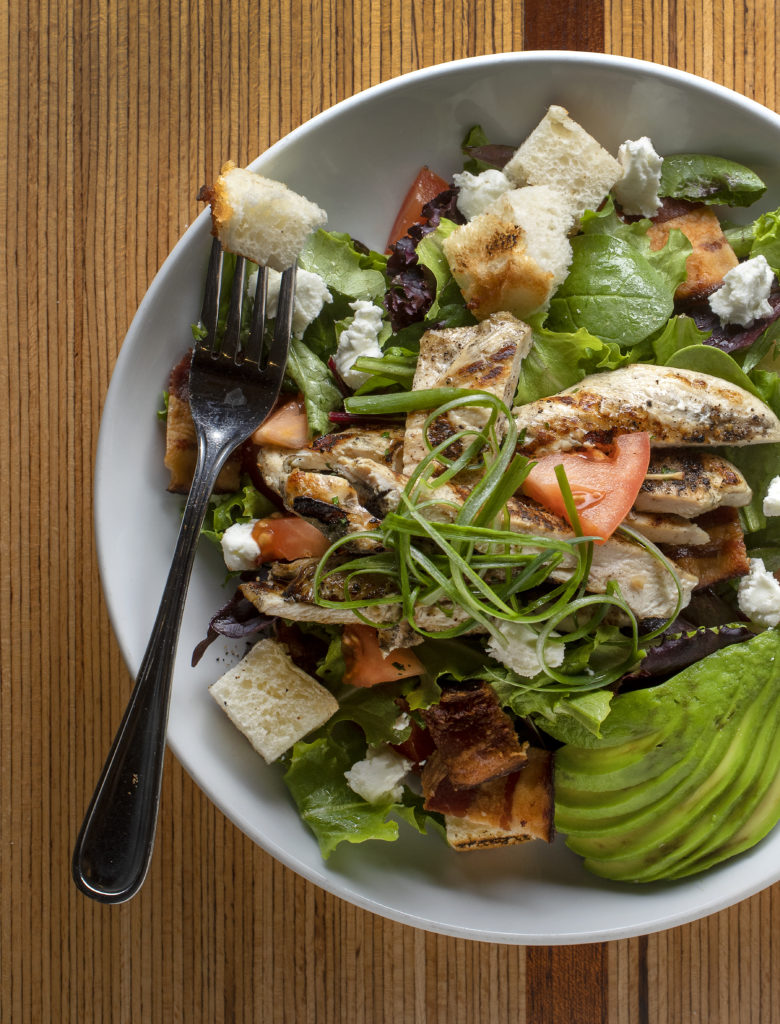 Panzanella Salad mixed greens, chicken, tomatoes, goat cheese, lemon dressing and grilled bread from Rickey's Eastbound in the Skyhawk neighborhood of Santa Rosa. (John Burgess/The Press Democrat)