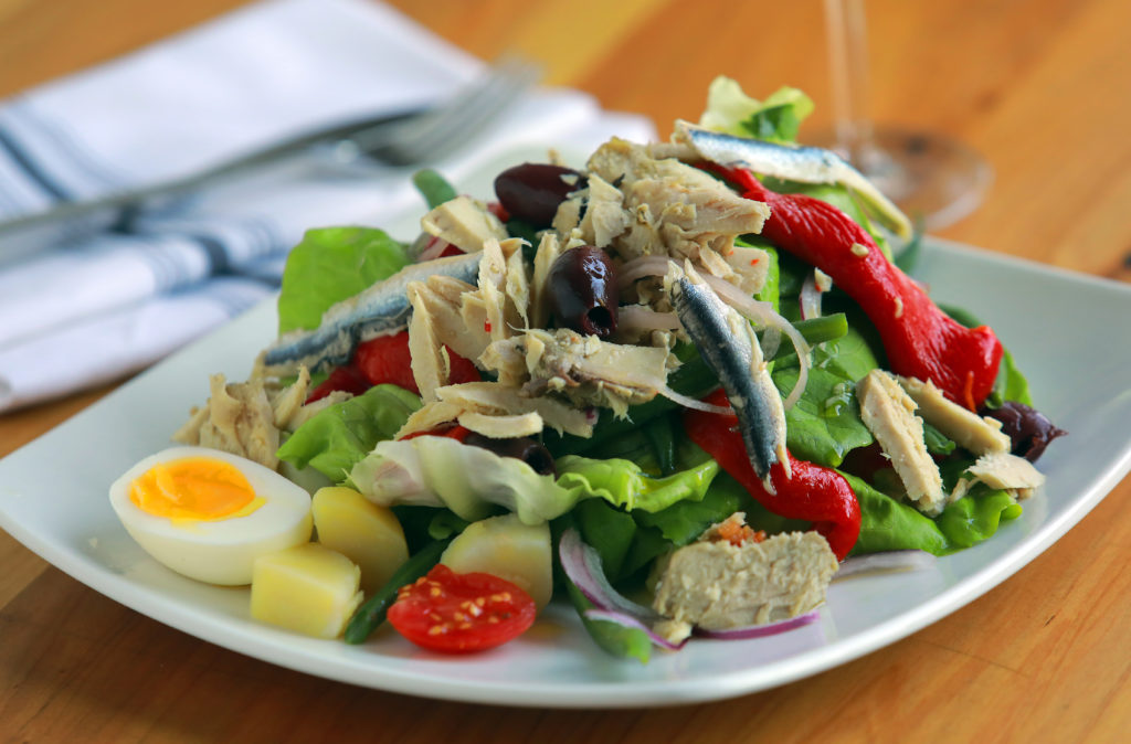 Classic Nicosia Salad with albacore tuna, roasted bell pepper, kalamata olives, haricot vert, 6 minute egg, cherry tomatoes, and house champagne vinaigrette from The Shuckery in Petaluma. (photo by John Burgess/The Press Democrat)
