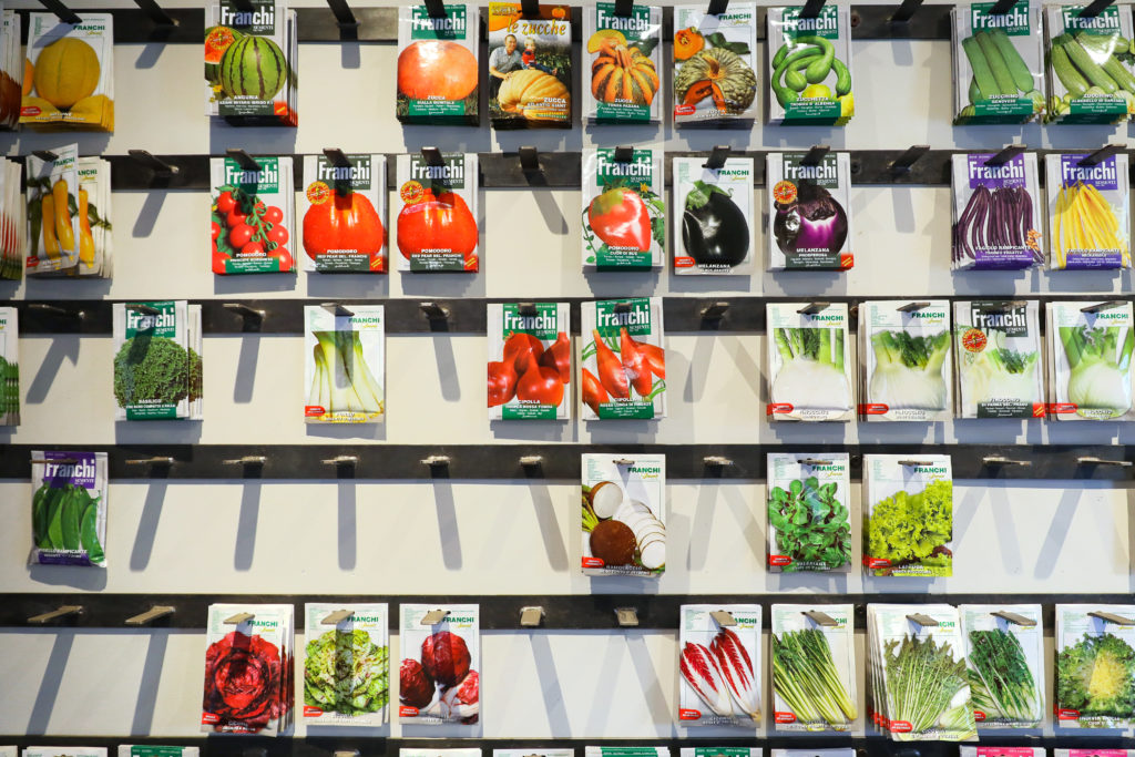 Seed packets hang on a wall at MIX Garden in Healdsburg. (Christopher Chung/ The Press Democrat)