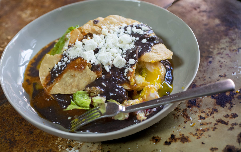 Huevos Rancheros with crispy house made tostada, olive oil fried hen egg, tomato-habanero sauce and queso fresco from the pick-up/delivery menu at Mateo’s Cocina Latina in Healdsburg. (photo by John Burgess/The Press Democrat)