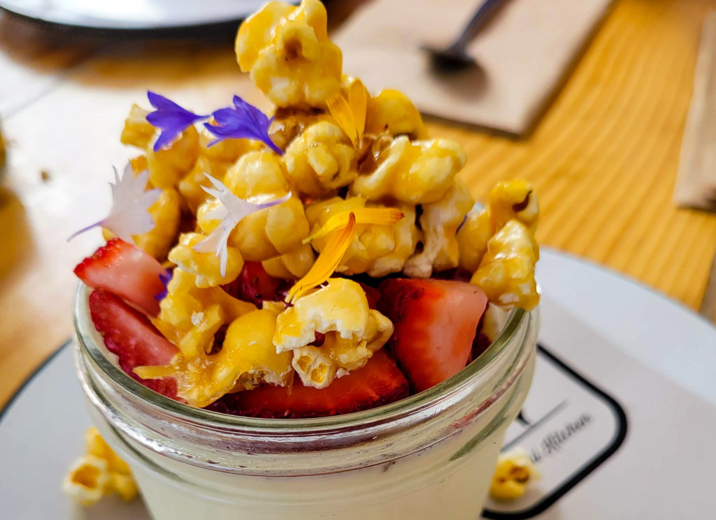 Panna cotta with caramel corn and strawberries at Dillon Beach Coastal Kitchen in Dillon Beach. (Heather Irwin/Sonoma Magazine)
