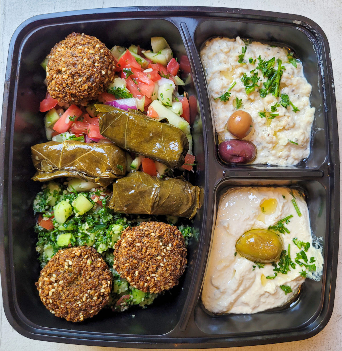 Mezze platter from Falafel Hut in Santa Rosa. (Heather Irwin/The Press Democrat)