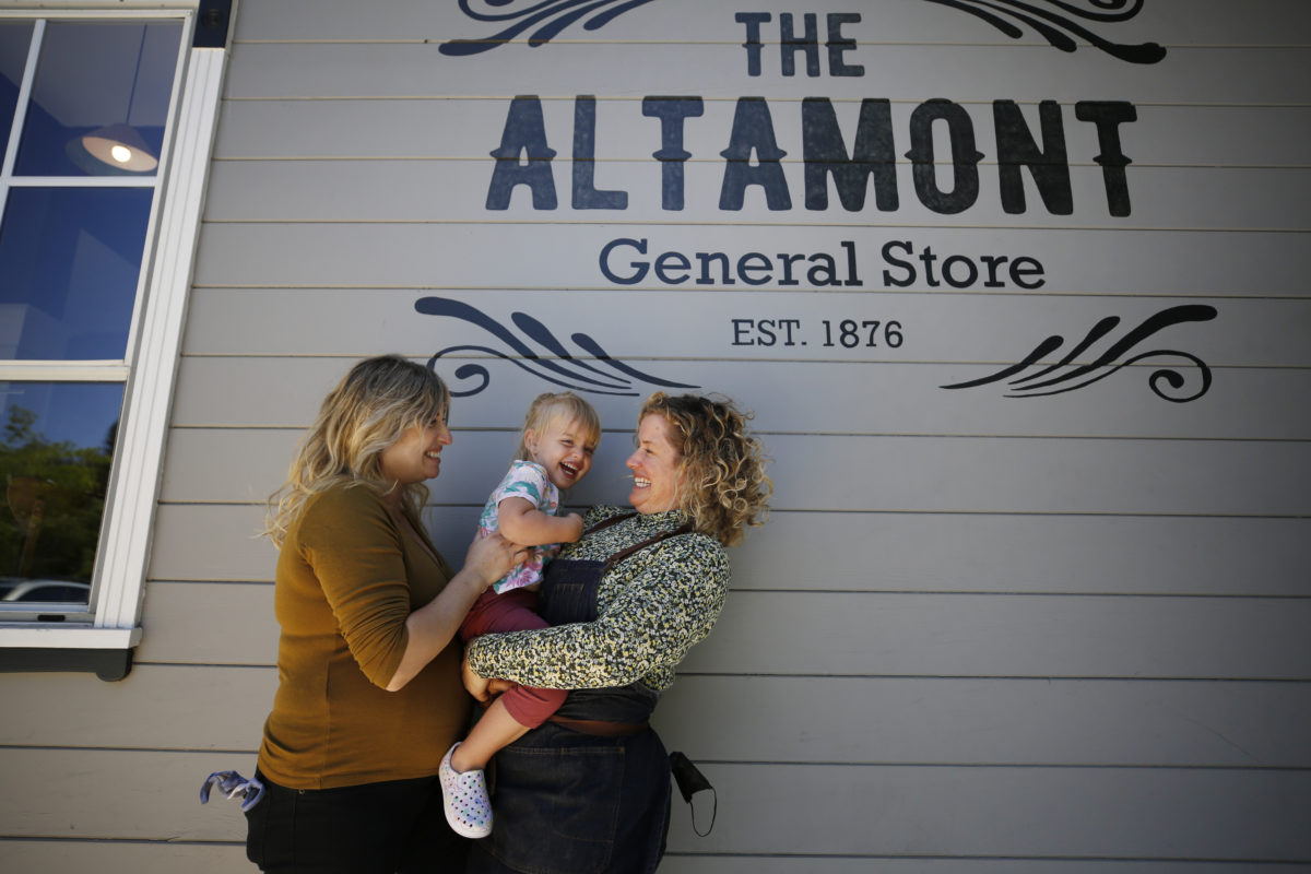 Andzia Hofftin, left, her wife Jenay Hofftin and their daughter Ever, 2, at The Altamont General Store in Occidental, Calif., on Thursday, May 13, 2021. (Beth Schlanker/Sonoma Magazine)