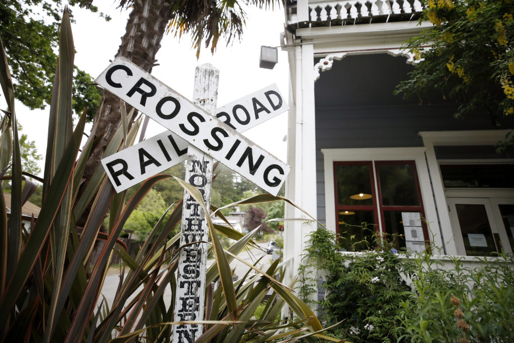 A railroad crossing sign outside the Howard Station Cafe in Occidental, Calif., on Thursday, May 13, 2021. (Beth Schlanker/Sonoma Magazine)