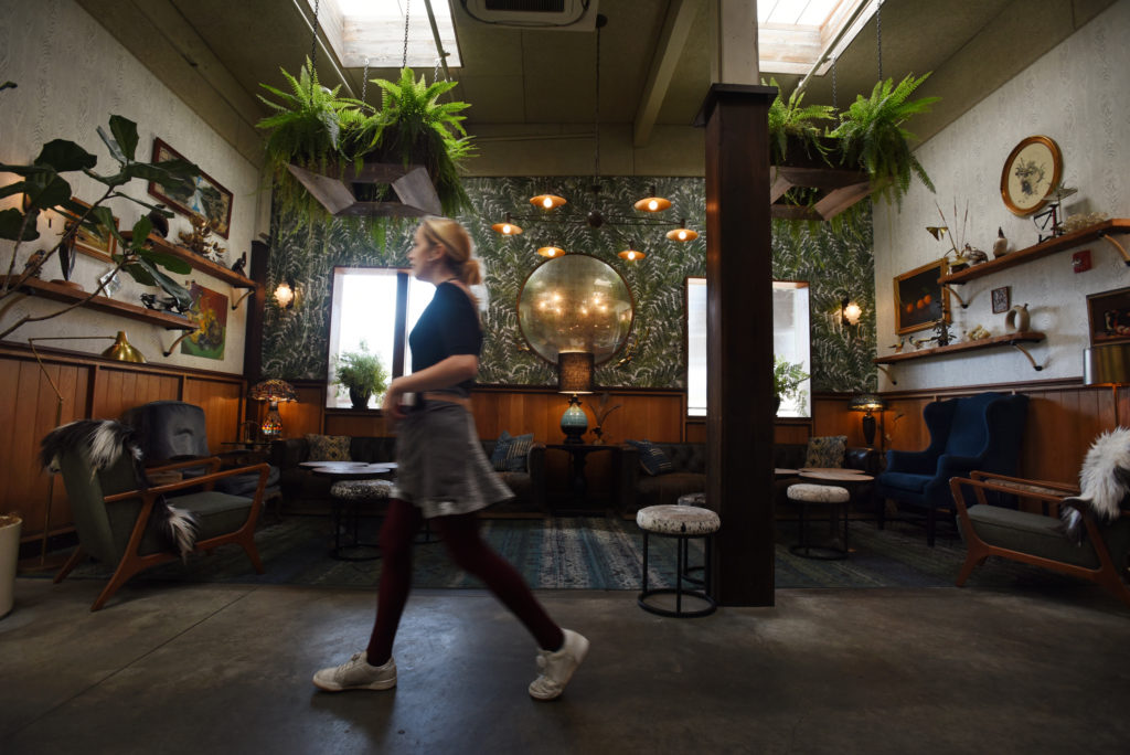 Anna Leigh Bodo walking by the indoor lounge area at Fern Bar which is joining a growing list of restaurants now requiring patrons to either show a vaccination card or proof of a negative COVID test within the past 48 hours if they wish to enter their indoor space in Sebastopol, Calif. on Wednesday, July 28, 2021. Customers may also show a photo of their vaccination card or use the state’s QR code system. (Photo: Erik Castro/for The Press Democrat)