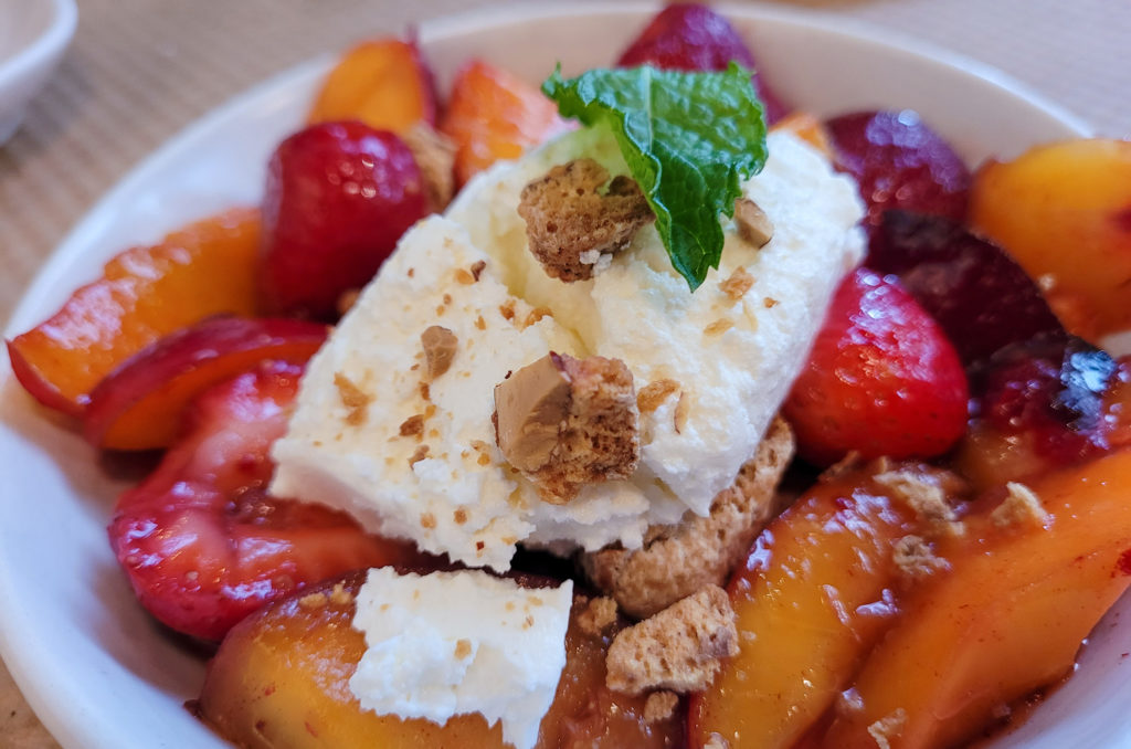 Seasonal fruit cheesecake with biscotti at Central Market in Petaluma. (Heather Irwin/Sonoma Magazine)