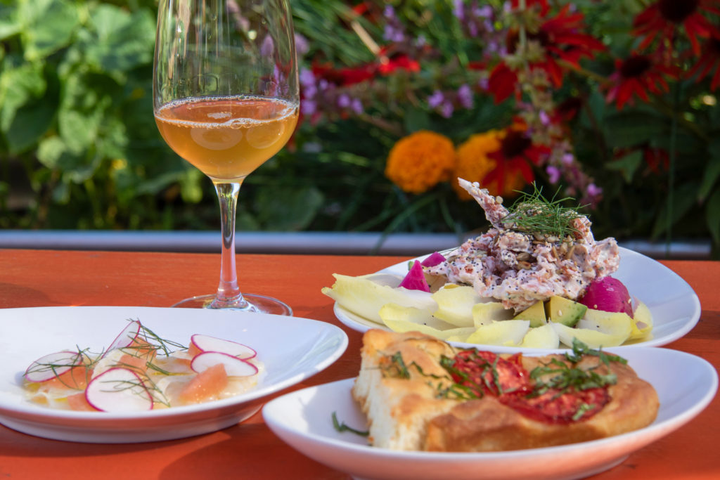 Scallops, trout pate and tomato foccaccia at The Spinster Sisters in Santa Rosa. (Heather Irwin/Sonoma Magazine)