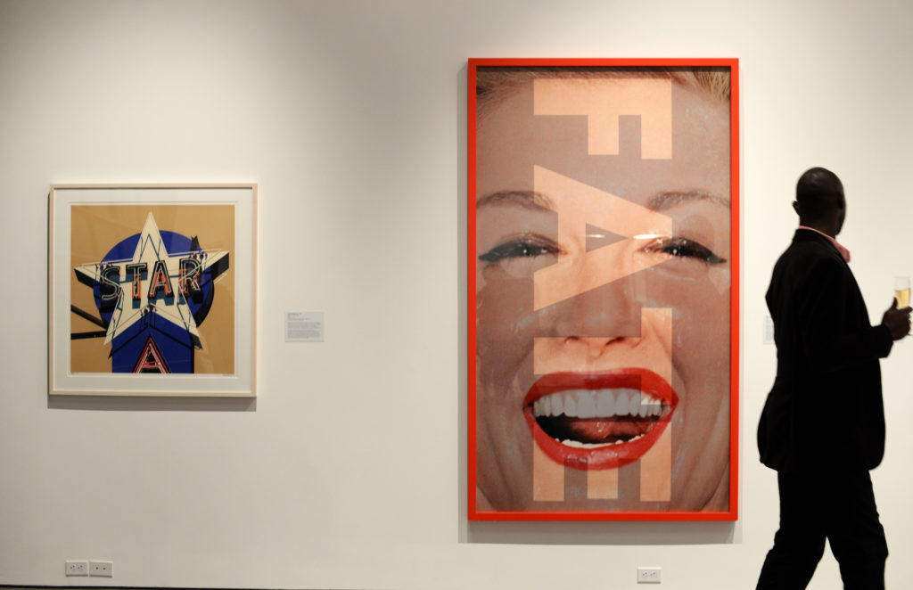 Bryant Key of Oakland, California perusing the Jordan D. Schnitzer collection during the Studio 54 opening party at the new Art Museum of Sonoma County located in downtown Santa Rosa. April 11, 2015. (Photo: Erik Castro/for The Press Democrat)