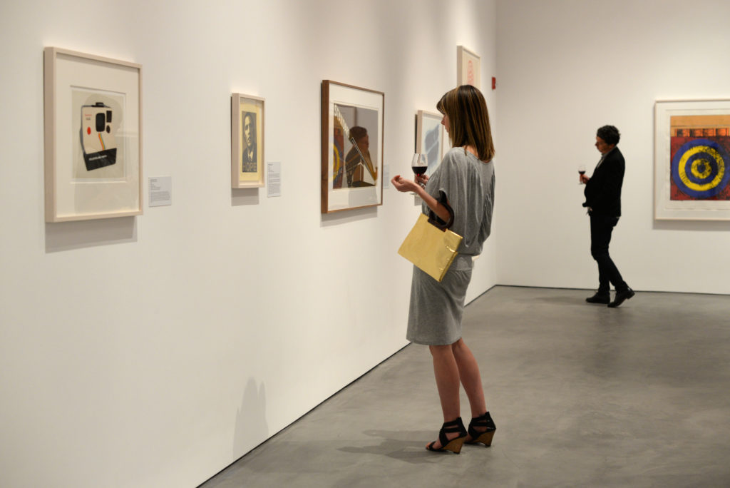 Deirdre Holbrook, left and Stett Holbrook perusing the Jordan D. Schnitzer collection during the Studio 54 opening party at the new Art Museum of Sonoma County located in downtown Santa Rosa. April 11, 2015. (Photo: Erik Castro/for The Press Democrat)