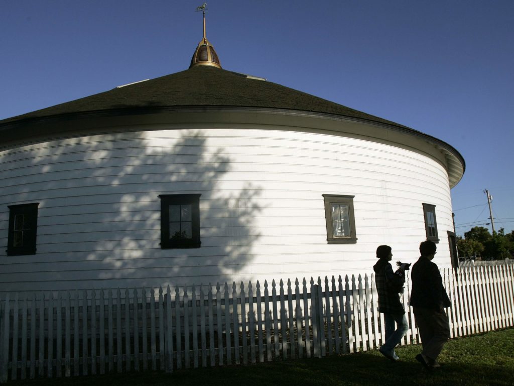 West Side neighbors Lea Barron-Thomas, left, and Carol Dean walk their neighborhood together several times a week. Their walks often take them by the DeTurk Round Barn. Shot on Tuesday June 5, 2007 for Santa Rosa magazine. ( Press Democrat / Charlie Gesell )