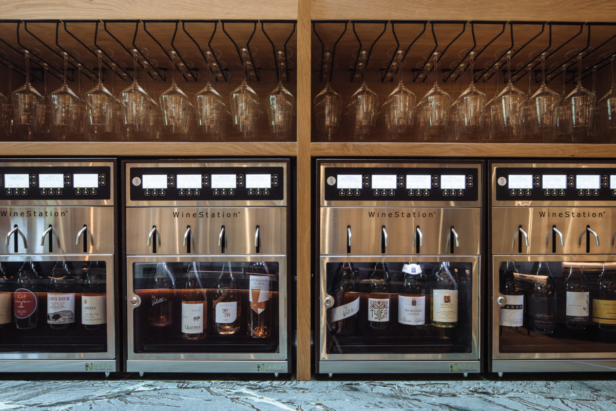 The Wine Wall allows visitors to select tastes, small pours or full pours at The Matheson in Healsburg. (Michael Woolsey/Sonoma County Tourism)