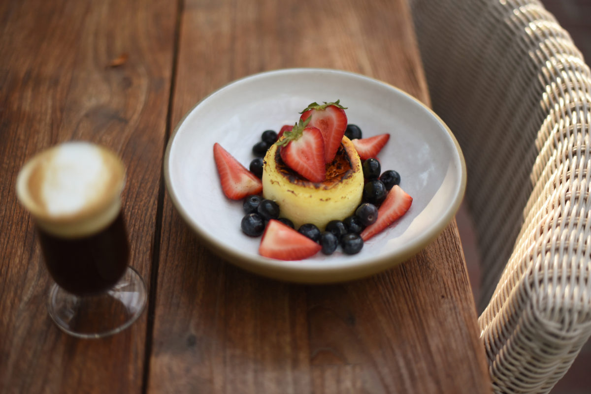 Basque cheesecake with vanilla macerated berries and served with an Irish coffee at Layla restaurant at MacArthur Place Hotel and Spa in Sonoma. (Erik Castro/for The Press Democrat)