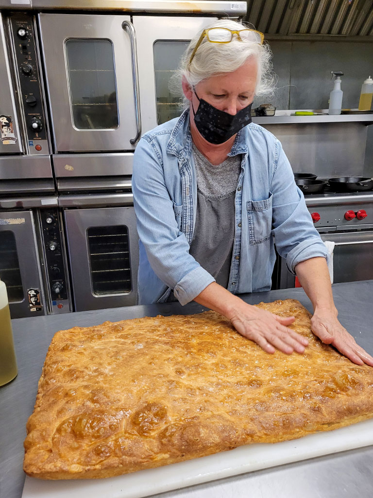Alison making the lemon herb focaccia at Stellina Pronto in Petaluma. Heather Irwin, Sonoma Magazine