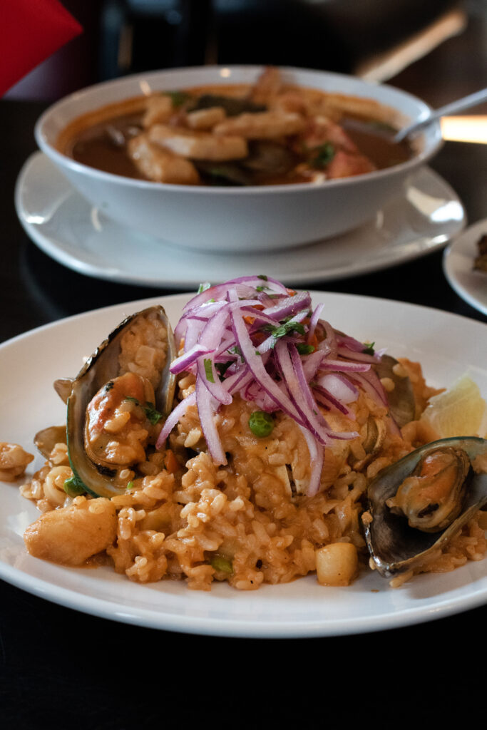 Arroz Con Marisco, $25: A heaping plate of creamy Peruvian-style paella loaded with seafood in a savory aji panca pepper sauce. There's almost too much seafood stuffed into this crowd-feeding dish. (Heather Irwin/Sonoma Magazine)