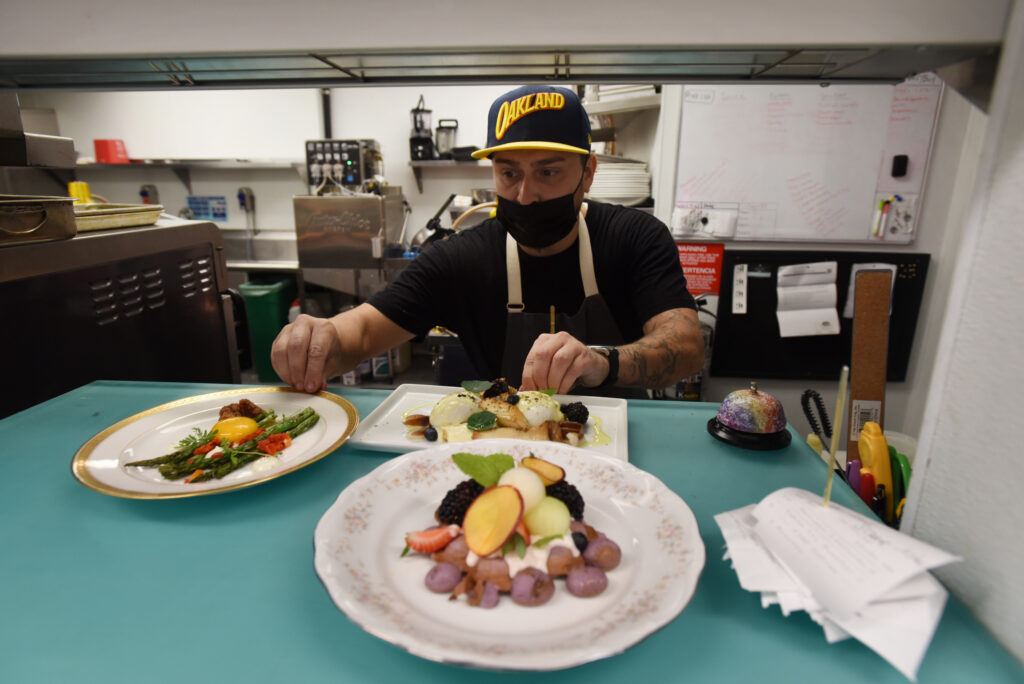Chef/Co-Owner Jeremy Cabrera runs his entire kitchen alone and spends his days off sourcing local ingredients for his menu at 4th Street Social Club restaurant in downtown Santa Rosa, Calif. Photo taken Saturday, Sept. 18, 2021. (Erik Castro / For The Press Democrat)