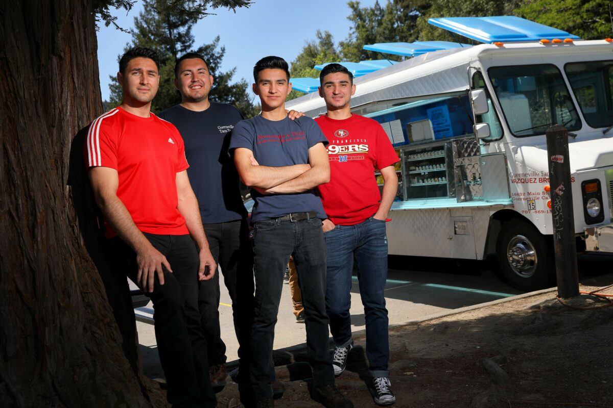 The Vazquez brothers: Andre, left, Rick, Sebastian, and Jorge, with their Guerneville Taco Truck. (Christopher Chung/ The Press Democrat)