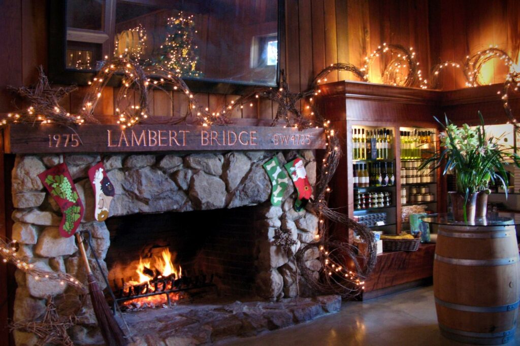 Lambert Bridge Winery on West Dry Creek Road near Healdsburg has a cozy tasting room with a fireplace, shown lit for the holidays. (Courtesy of Lambert Bridge Winery)