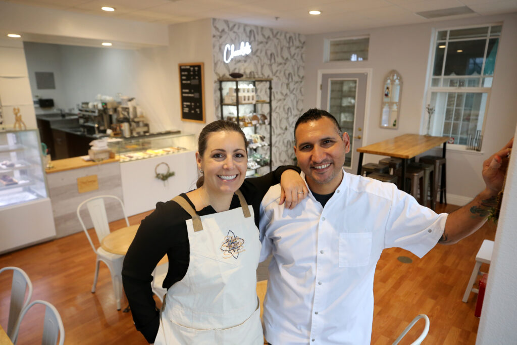 Owners Robert and Tara Nieto during the grand opening of Fleur Sauvage Chocolates in Windsor, Calif., on Wednesday, December 15, 2021. (Beth Schlanker/The Press Democrat)