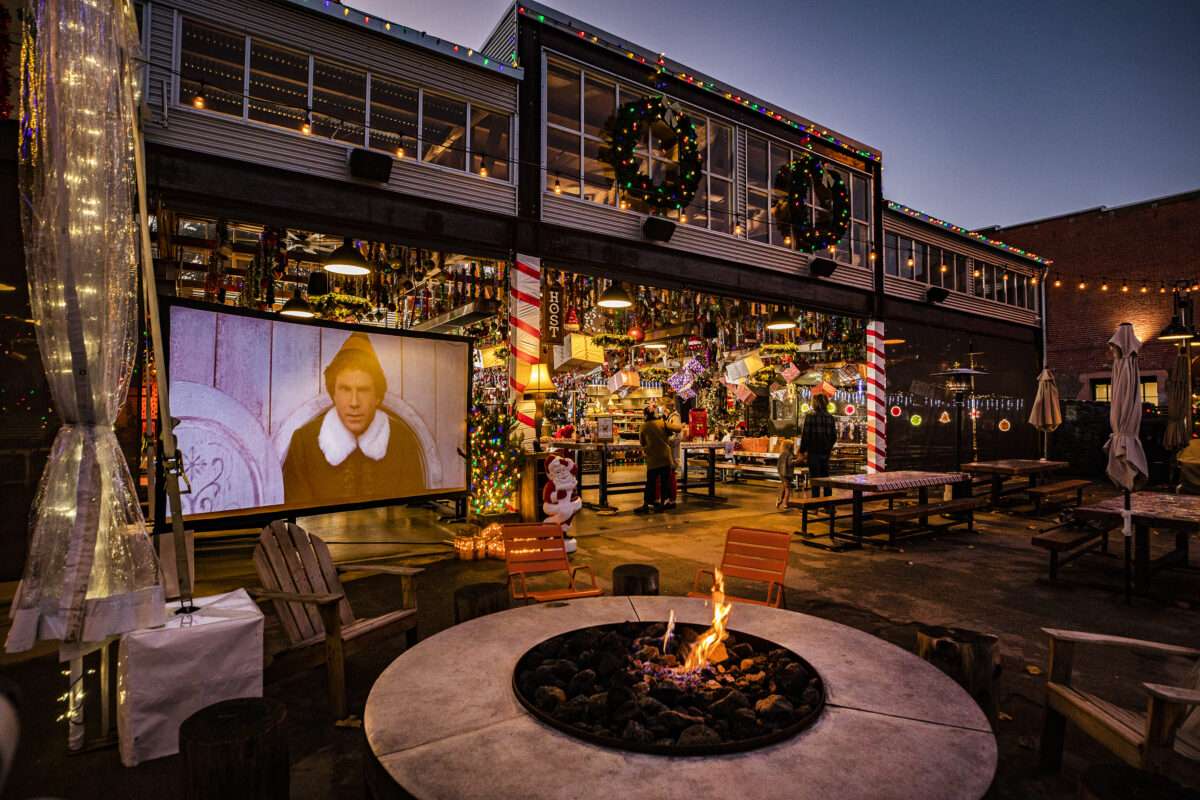 Brewster's Beer Garden + Restaurant in Petaluma is decked out with hundreds of Christmas decorations, the movie Elf projected on a big screen and Christmas music for customers picking up to go orders under the new COVID-19 shelter in place rules. (John Burgess/The Press Democrat)