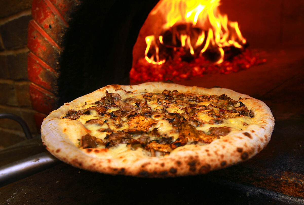 The Funghi di Limone pizza with white sauce, shaved artichokes finished with lemon oil from Rosso Pizzeria in Santa Rosa. (John Burgess/The Press Democrat)