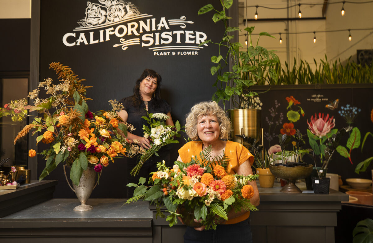 Owners Nichole Skalski, back, and Kathrine Green of California Sister Plant and Flower in the Barlow district of Sebastopol. (Photo by John Burgess/The Press Democrat)