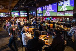 Soccer fans celebrate a U.S. goal in the first half against Wales in the first round of the World Cup at the Victory House in Epicenter Santa Rosa Monday, November 21, 2022. (John Burgess/Press Democrat)