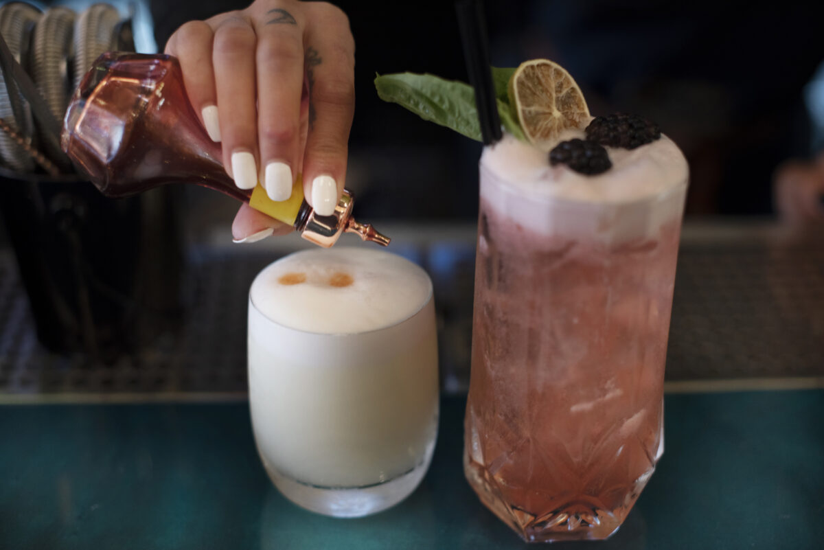 According to the owners these are two of the most popular drinks in Peru: a Pisco Sour, left, and Vamos Boys which is made of Pisco, Elderflower, vermouth bianco and Tio Pepe at Warike Restobar in downtown Santa Rosa on Wednesday, Jan. 5, 2022. (Erik Castro/for The Press Democrat)