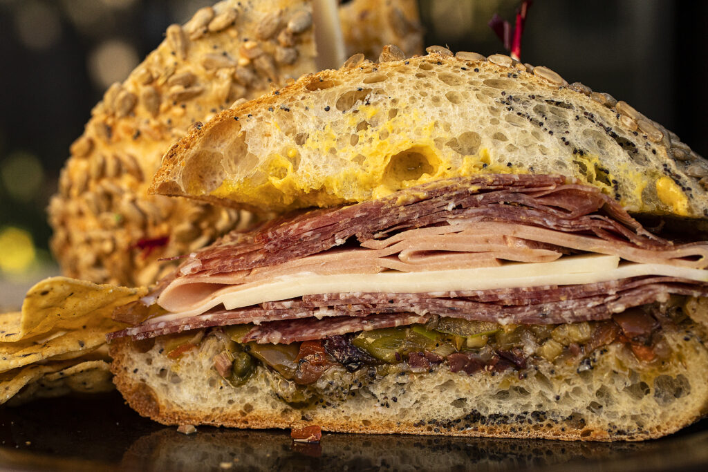 The Muffaleta sandwich is loaded with toscano, mortadella, salami, provolone, house made muffaletta spread, olive oil & dijon from Ulia's Delicatessen in Santa Rosa. (Photo by John Burgess/The Press Democrat)