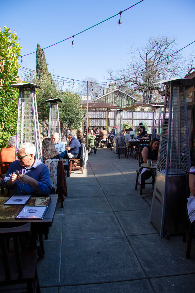 Outdoor patio at Lo & Behold in Healdsburg. (Heather Irwin/The Press Democrat)