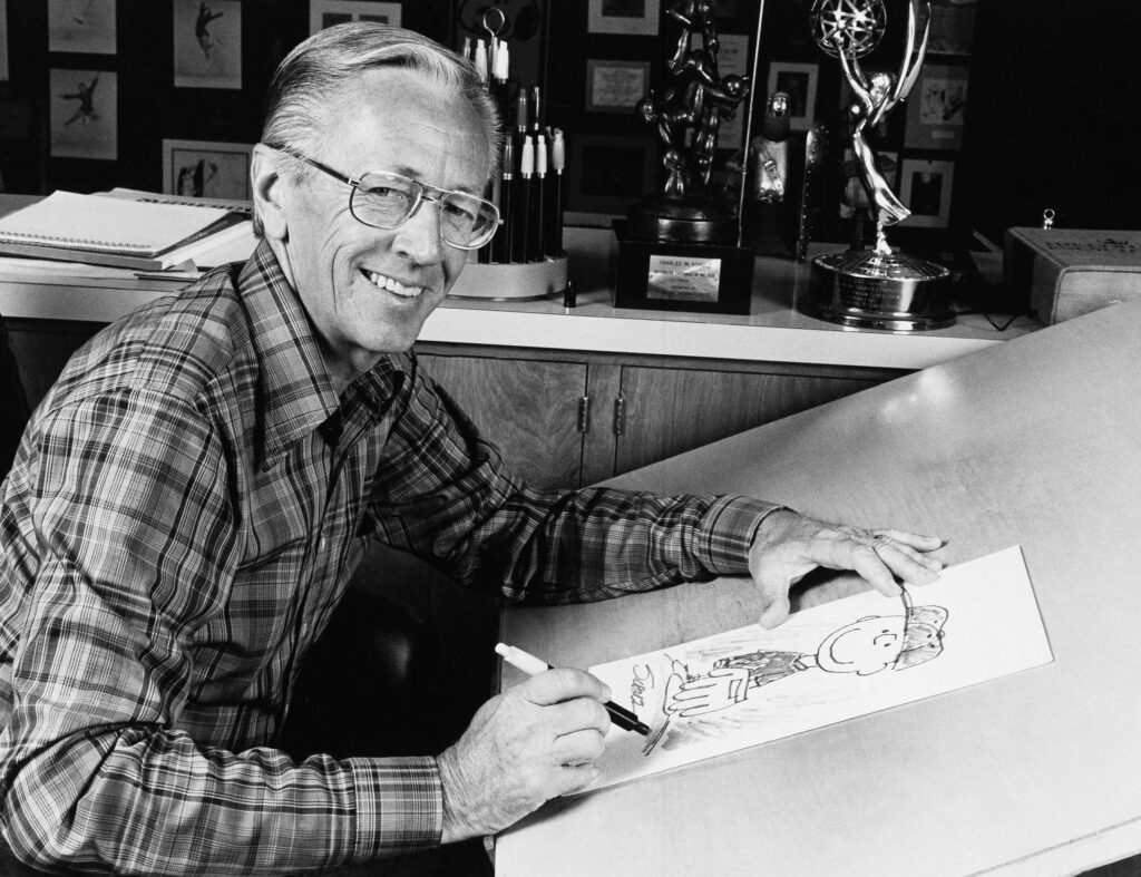 2/7/21: On Feb. 9, 1981, Charles Schulz, creator of the cartoon strip "Peanuts," was awarded the National Hockey League's Lester Patrick Trophy at a benefit dinner in Los Angeles. The award was presented to Schulz for his "outstanding service to hockey" through his cartoon strip. Schulz played on Santa Rosa's gold medal Senior Olympic hockey team. Proceeds from the awards banquet went to the Juvenile Diabetes Foundation. 12/20/20: On December 22, 1974, cartoonist Charles Schulz received the "Silver Stick" award from the Northland Hockey Division of Larson Industries, Inc., and a Congressional Certificate of Commendation from Congressman Don Clausen, for his support of youth hockey. Schulz was the first non-professional hockey player to receive the "Silver Stick." (AP Photo) 10/04/2020: On October 2, 1950, Charles Schulzs comic strip, "Peanuts" debuted in seven American newspapers. The syndicate paid Schulz $90 for his first month's worth of strips. (AP Photo) Original Caption: The new 'Peanuts' movie, premieres Friday, Nov. 6. Take a moment to explore classic photos from the PD archive, showing hometown hero Charles Schulz and his beloved 'Peanuts' gang. Cartoonist, Charles M. Schulz, 1978. (AP Photo)