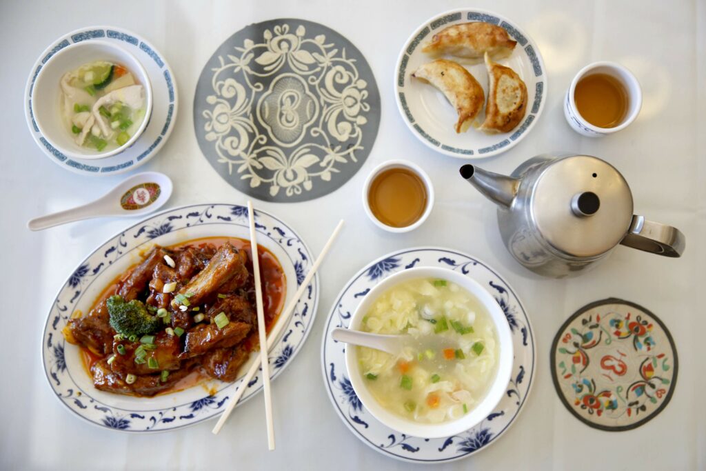 Szechuan Spareribs, Egg Flowers Soup, and Chicken Pot Stickers at Chinatown Restaurant in Petaluma. (Beth Schlanker/The Press Democrat)